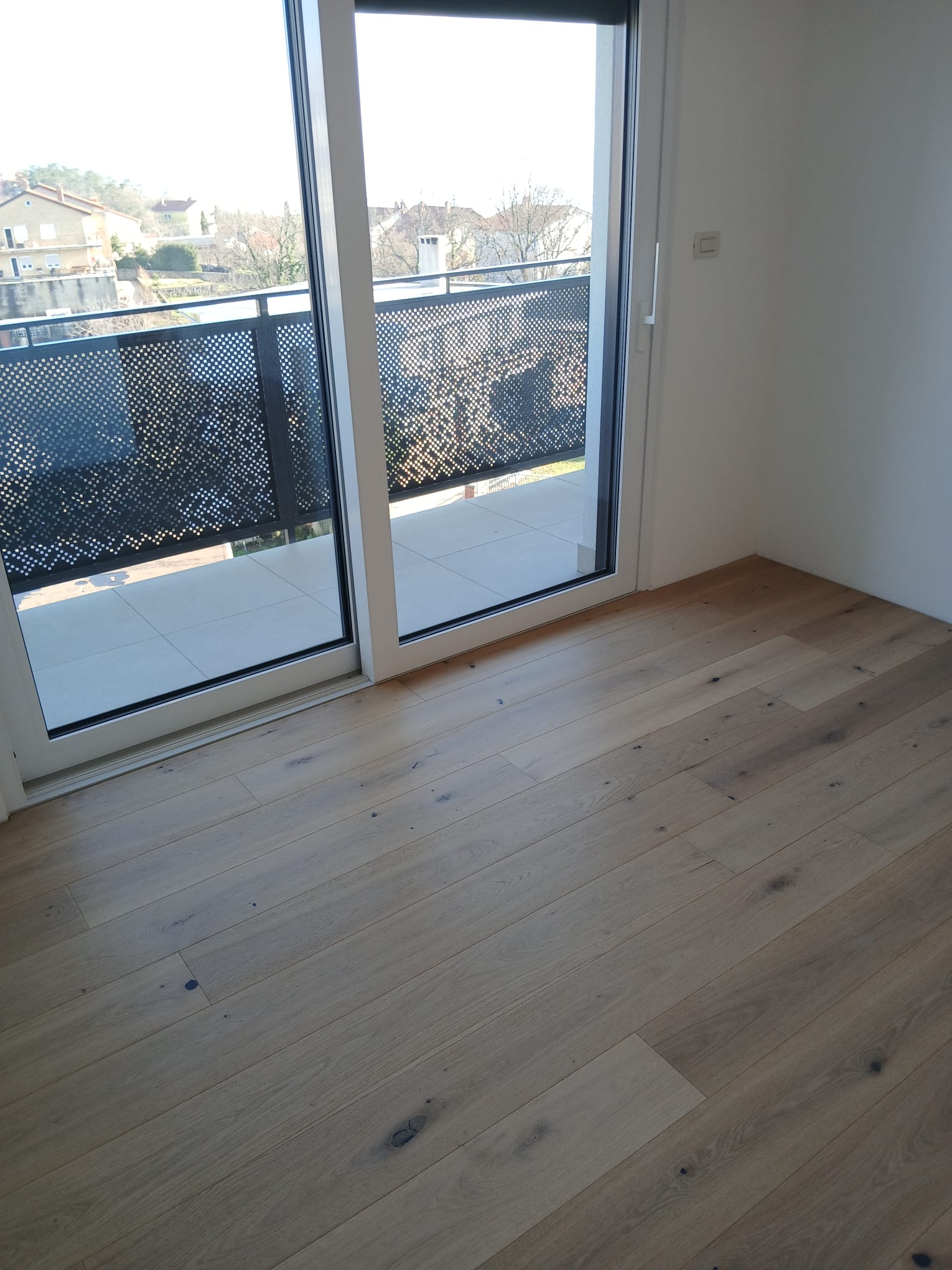 Bedroom with balcony access